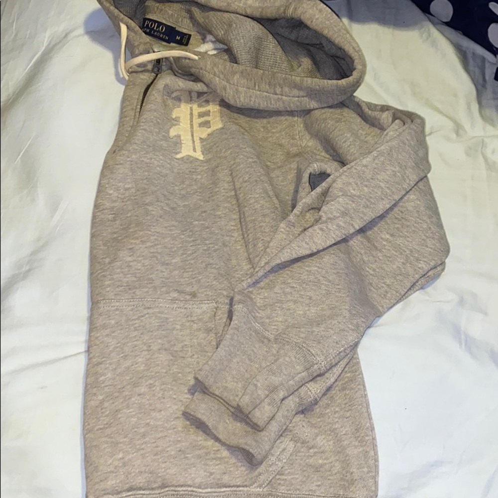 A gray polo hoodie